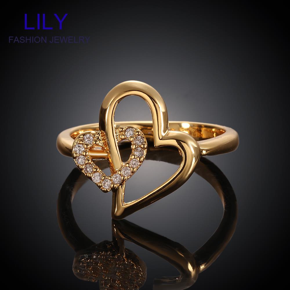 Gold heart shaped wedding rings