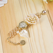 Freeshipping New relogio masculino women quartz Fashion lady Bracelet Watch Pearl Flower Leaf Pendant diamond quartz