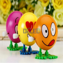 2016 New Cool On The Chain Clockwork Doll Expression Face Bouncing Ball Children’s Educational Toys Gifts Wind up Toys