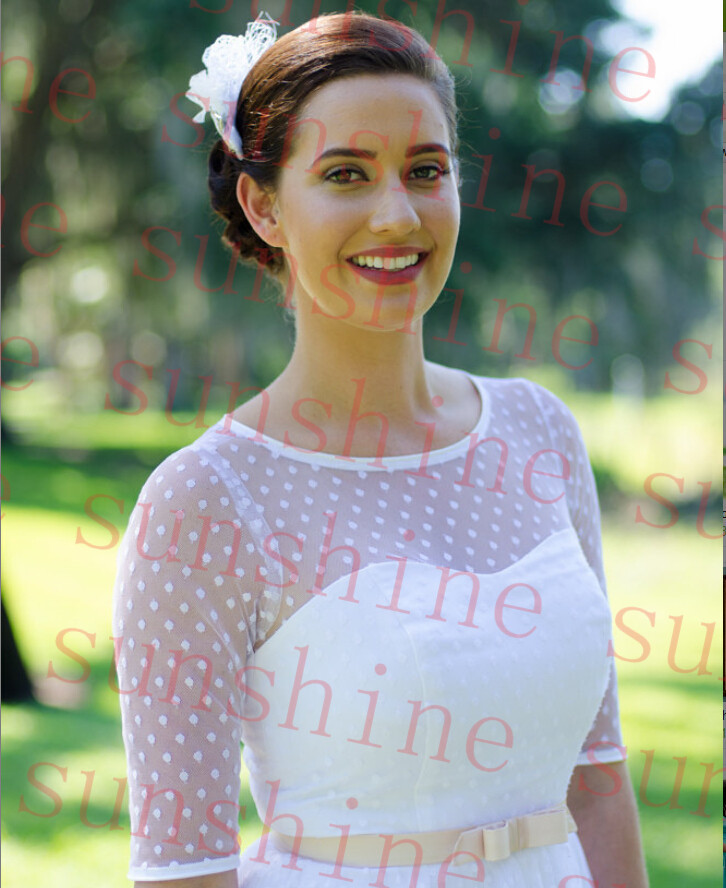 White polka dot wedding dress