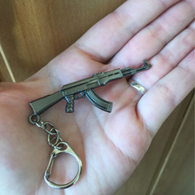 2016 New Counter Strike CS GO M4A1 AK47 Gun Keychain Trinket Men Sniper Awp Key Chain Ring Jewelry Car Accessory Gift Souvenirs