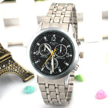 2015 Vintage hombres de esfera redonda correa de banda de acero relojes de cuarzo analógico reloj reloj Casual reloj ventas calientes relojes de pulsera