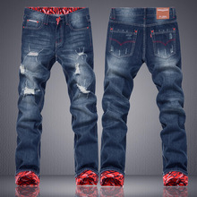2016 men’s hole in jeans Torn hems side streets The cowboy pants tide
