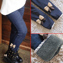 New 2016 winter spring girls bow jeans pants cotton children cashmere pants kids warm elastic waist legging wholesale and retail