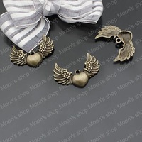 (22311)Alloy Findings,charm pendants,Antiqued style bronze tone Angel wings 100g,about 23-25PCS