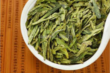 Mingqian premium 2014 spring new tea Westlake Longjing tea chinese green tea whitening send fire Jar