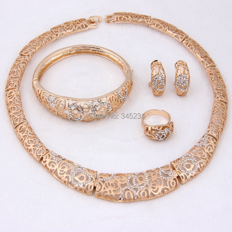 http://g03.a.alicdn.com/kf/HTB1g.GQHpXXXXXnapXXq6xXFXXXo/Wholesale-top-qualtiy-dubai-african-costume-jewelery-set-18k-gold-plated-wedding-bridal-jewelry-sets-for.jpg