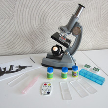 100X 400X 900X juguete de plástico iluminado luz niño educativos microscopio Monocular para los niños estudiante con lámpara y espécimen