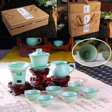 Longquan celadon tea high-end business gifts embossed fish kungfu tea set 10 sets of green.