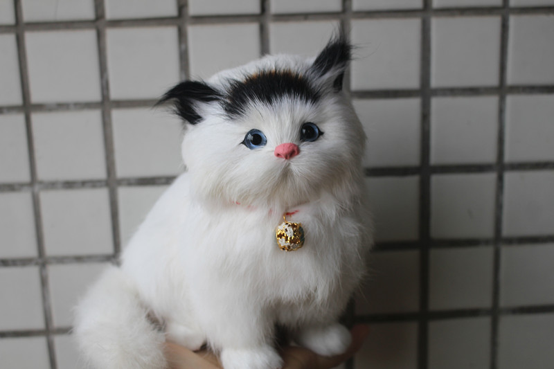 meowing cat plush