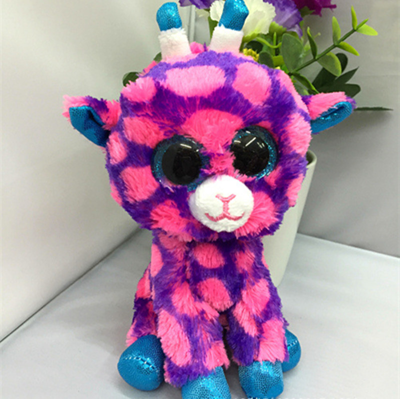 purple stuffed animal giraffe