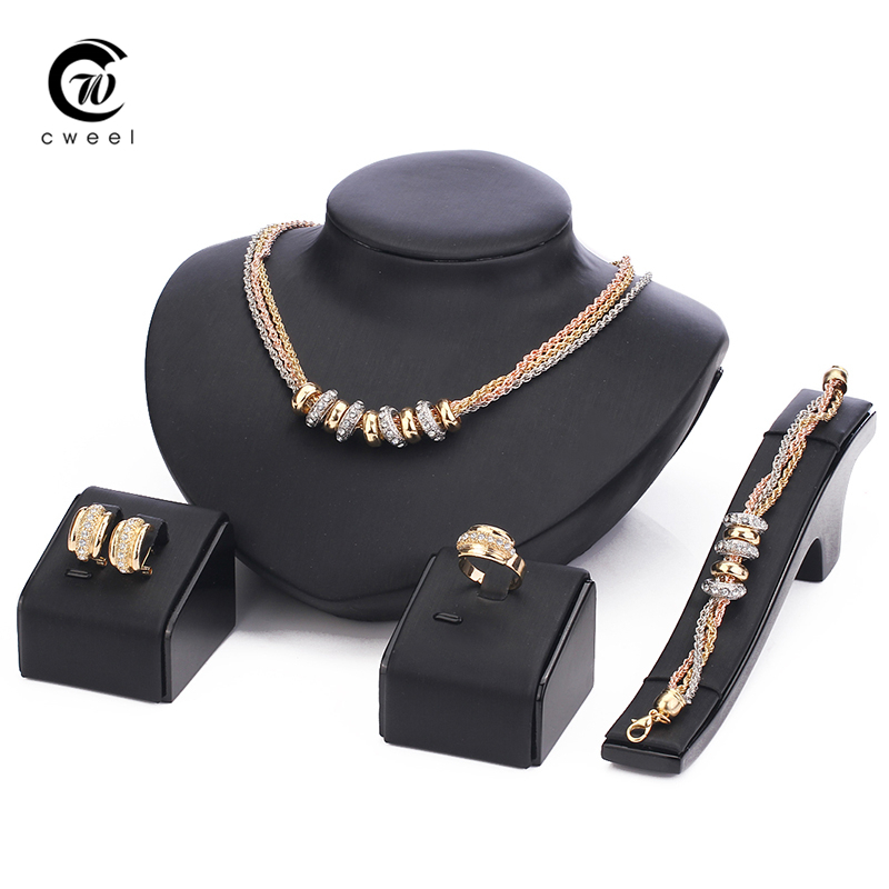 http://g03.a.alicdn.com/kf/HTB1plJ7IFXXXXXSXpXXq6xXFXXXF/African-Chunky-Woman-Jewelry-Sets-For-Women-Crystal-Bridal-Mix-three-colors-Plated-Hollow-Necklace-Earrings.jpg