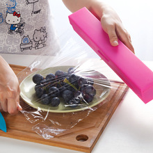 Alta definición pequeña plastic wrap cortador creativo film cortador cocina del color del caramelo gadgets
