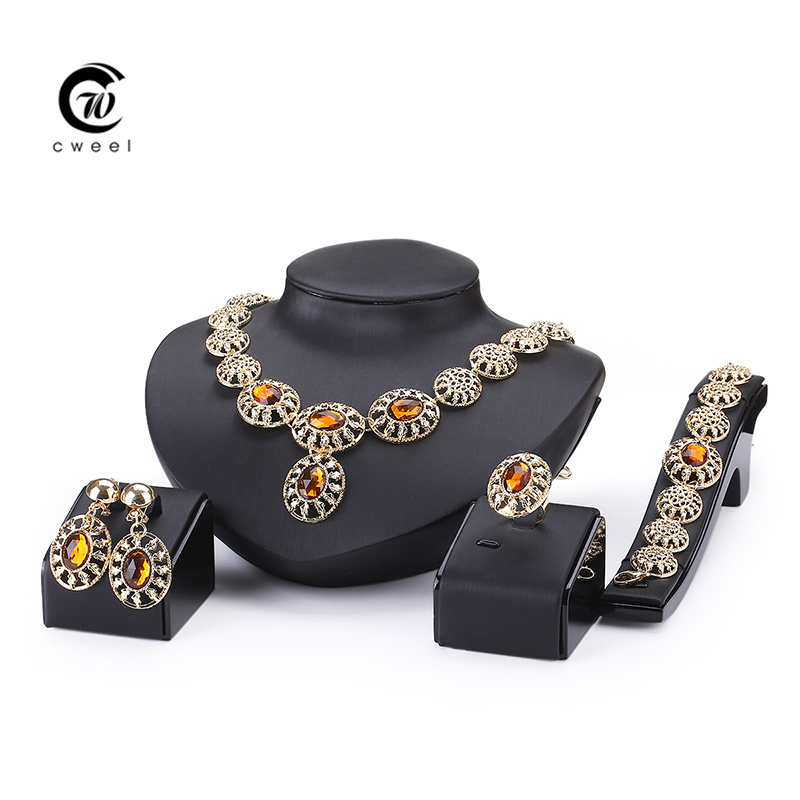 http://g03.a.alicdn.com/kf/HTB1tyB6IXXXXXaWXVXXq6xXFXXXc/Fine-Wedding-Accessories-African-Beads-Jewelry-Sets-Crystal-CZ-Diamond-Gold-Plated-Bridal-Necklace-Bracelet-Earrings.jpg