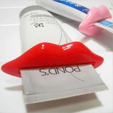 2pcs/lot multi-purpose multi- squeezer lips toothpaste dispenser red pink