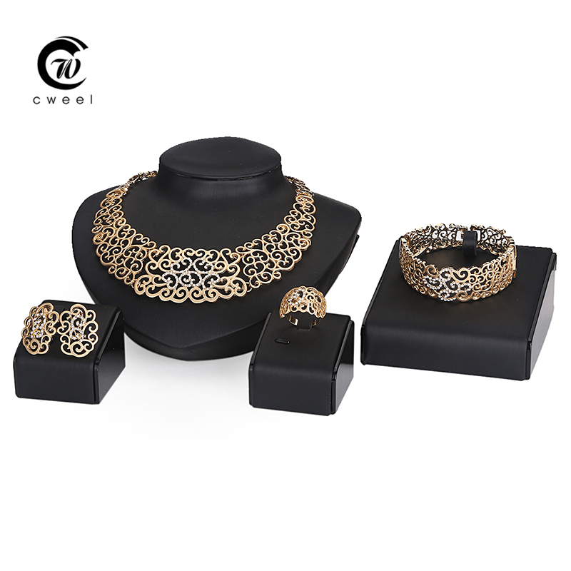 http://g03.a.alicdn.com/kf/HTB1ulb4IpXXXXciaXXXq6xXFXXXz/Fine-Jewelry-Sets-moda-accesorios-de-boda-perlas-africanas-cristalino-del-oro-plateado-pendientes-del-collar.jpg