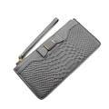 Occident Style Crocodile Print Ultra thin Purse Women Trendy Retro Embossing Bowknot Long Zipper Billfold Cowhide