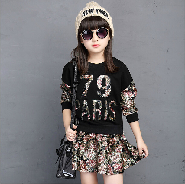 http://g03.a.alicdn.com/kf/HTB1zNGqIVXXXXbEapXXq6xXFXXXU/Wholesale-2015-autumn-girl-set-fashion-Korean-flower-printing-letter-number-princess-2-pieces-blouse-skirt.jpg